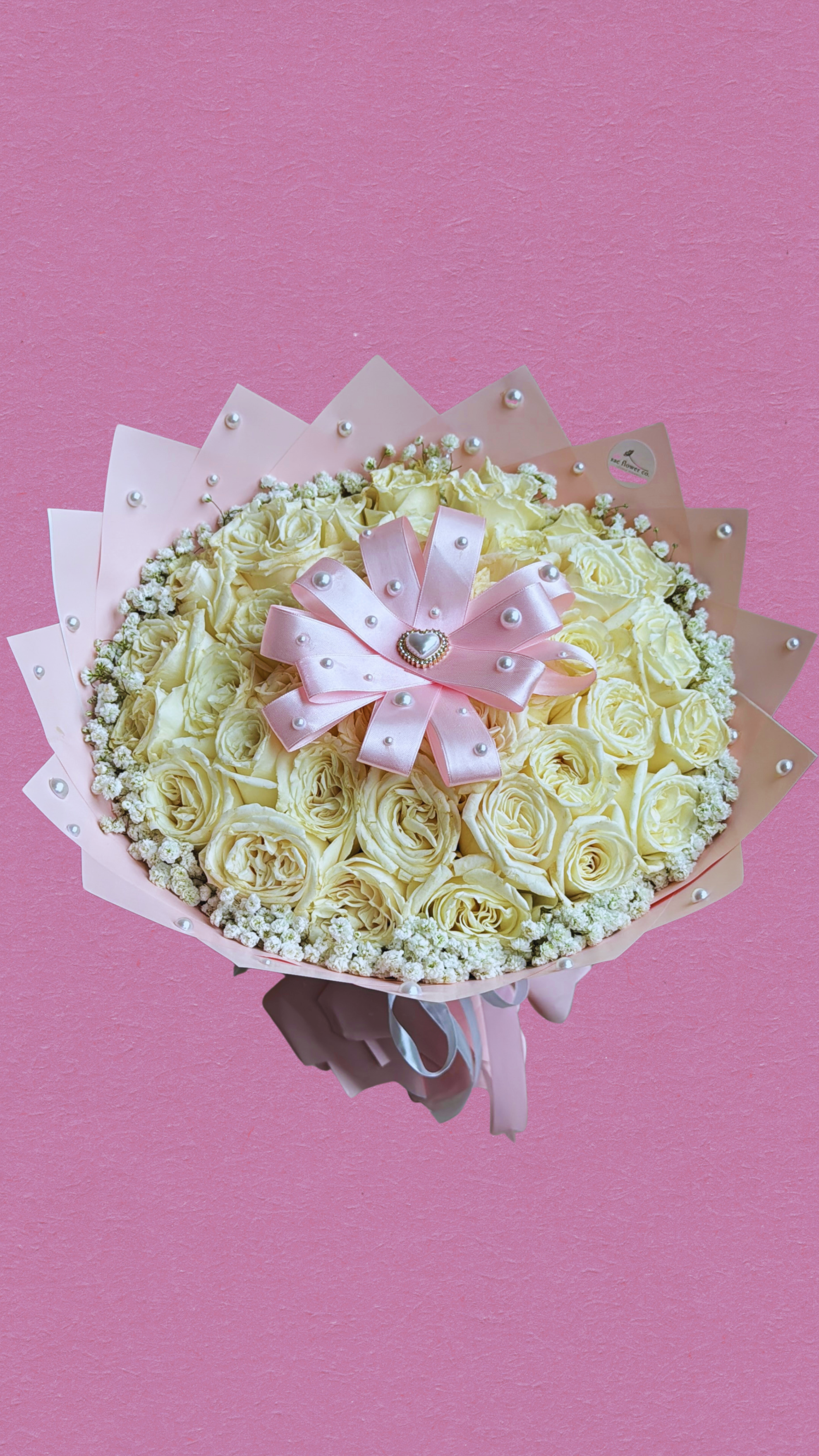 White Roses with Pink Throughout